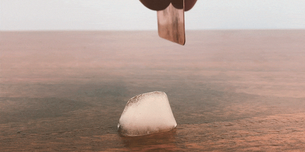 GIF showing ice melting under copper