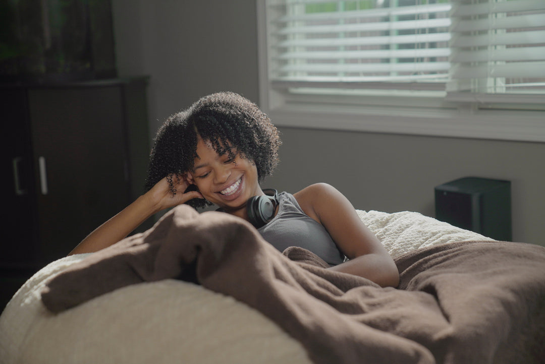 Woman sitting in Comfort Option Foam Bean Bag