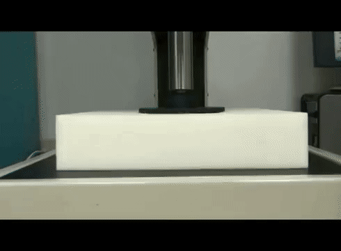 GIF showing compression on a piece of foam