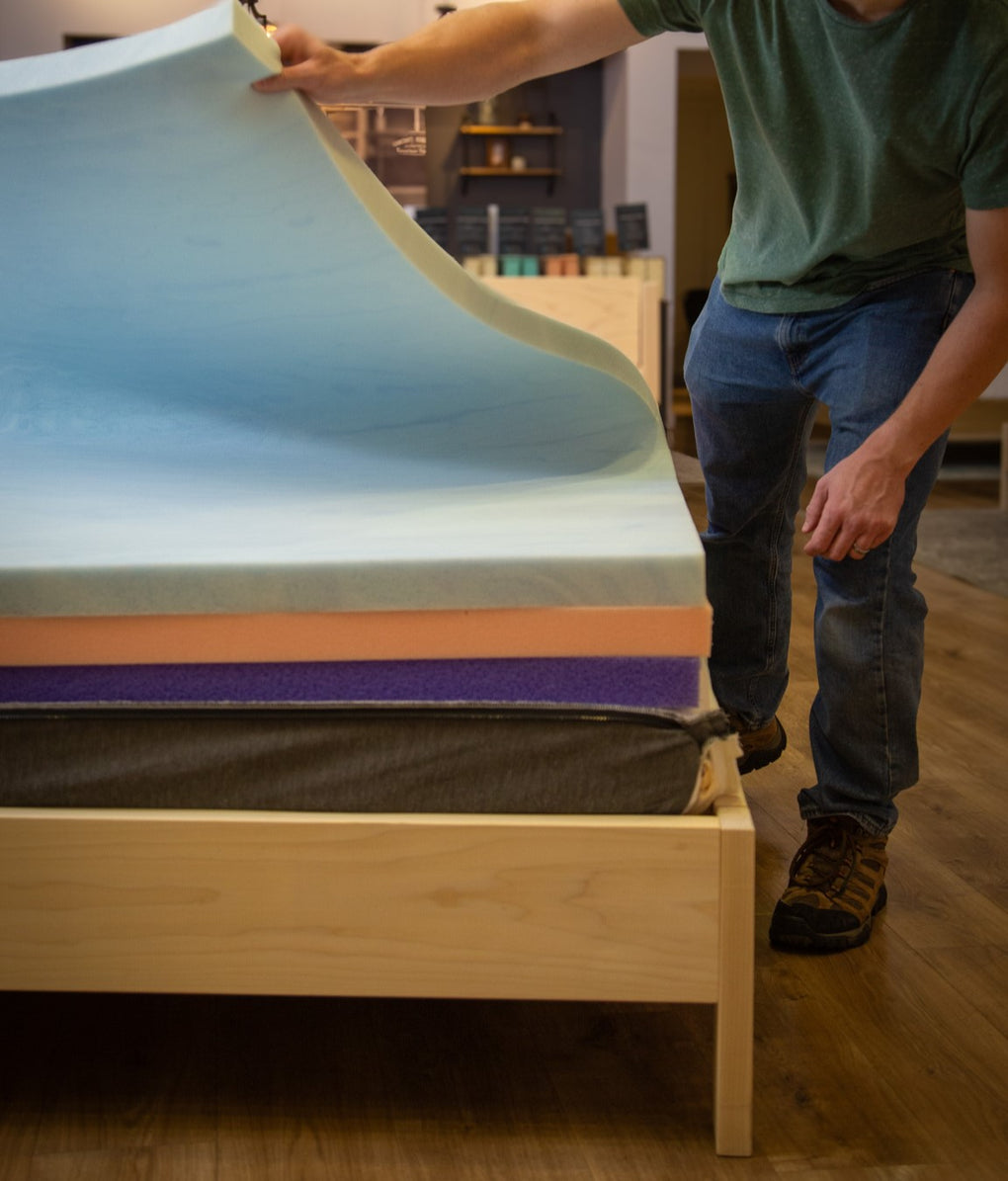 Image of changing the layers on a Comfort Option Mattress
