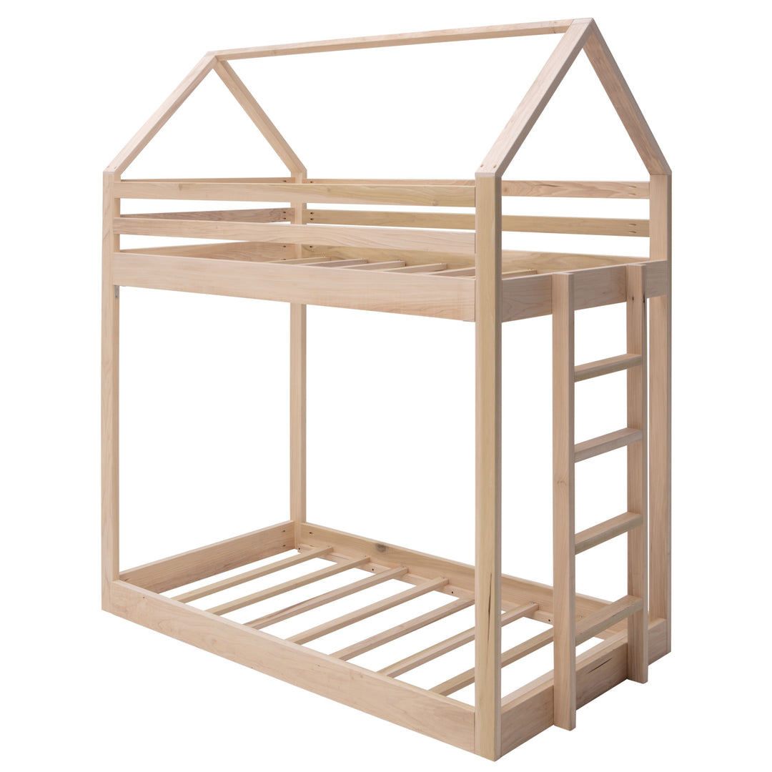 Wooden children's bed with a ladder on a white background