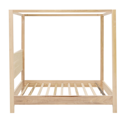 Wooden bed frame on a white background