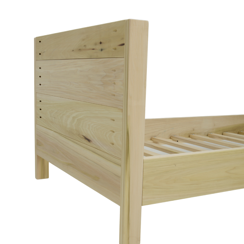 Wooden bed frame on a white background